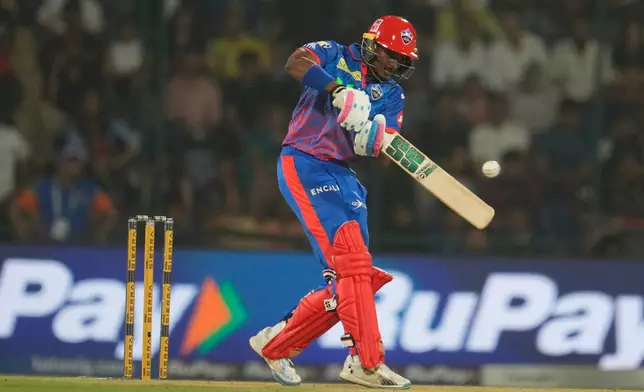 Delhi Capitals' Abishek Porel plays a shot during the Indian Premier League cricket match between Delhi Capitals and Royal Challengers Bengaluru in Delhi, India, Monday, April 27, 2026. (AP Photo/Manish Swarup)