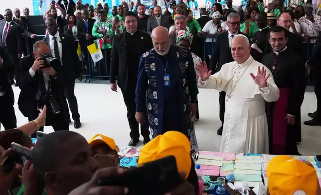 Pope Leo XIV, meets with the staff and patients of the "Jean Pierre Olie" Psychiatric Hospital in Malabo, Equatorial Guinea, Tuesday, April 21, 2026. (AP Photo/Misper Apawu)