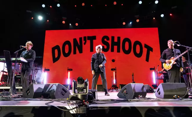 Gerald Casale, from left, Mark Mothersbaugh, and Bob Mothersbaugh of Devo performs during the first weekend of Coachella Valley Music and Arts Festival on Friday, April 10, 2026, in Indio, Calif. (Photo by Amy Harris/Invision/AP)