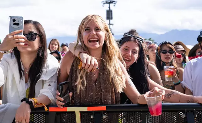 Festivalgoers are seen during the first weekend of Coachella Valley Music and Arts Festival on Sunday, April 12, 2026, in Indio, Calif. (Photo by Amy Harris/Invision/AP)