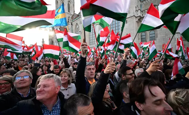 Supporters attend electoral campaign closing rally of Hungary's Prime Minister Viktor Orban and the governing Fidesz in Budapest, Hungary, Saturday, April 11, 2026. (AP Photo/Denes Erdos)