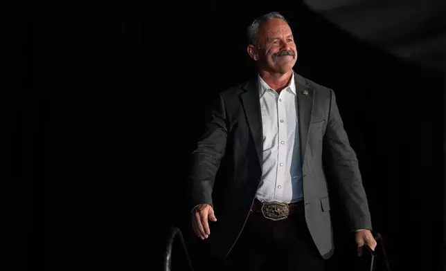 California gubernatorial candidate Riverside County Sheriff Chad Bianco walks toward the podium to speak at the California Republican Party Convention in San Diego, Saturday, April 11, 2026. (AP Photo/Jae C. Hong)