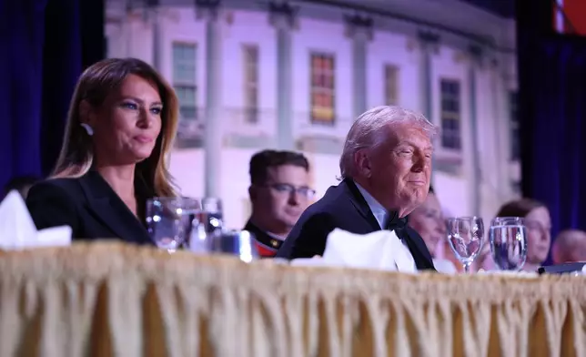 First lady Melania Trump and President Donald Trump attend the annual White House Correspondents Dinner at the Washington Hilton, Saturday, March 25, 2026, in Washington. (AP Photo/Tom Brenner)