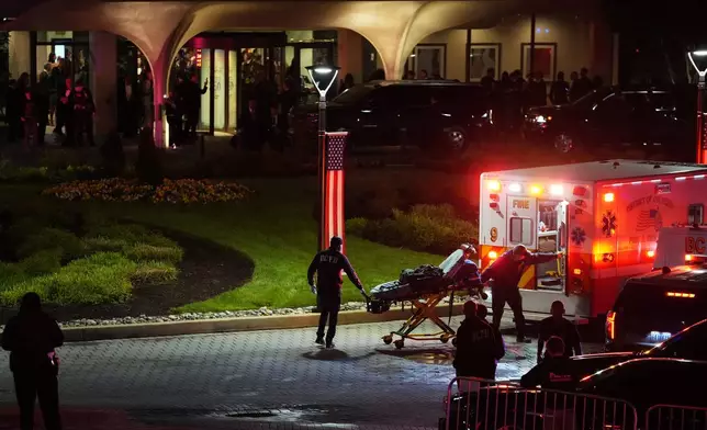An ambulance responds to an incident at the Washington Hilton during the White House Correspondents Dinner, Saturday, April 25, 2026, in Washington. (AP Photo/Allison Robbert)