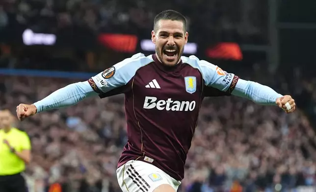 Aston Villa's Emi Buendia celebrates scoring their side's second goal during the Europa League quarterfinal second leg soccer match between Aston Villa and Bologna, in Birmingham, England, Thursday, April 16, 2026. (David Davies/PA via AP)