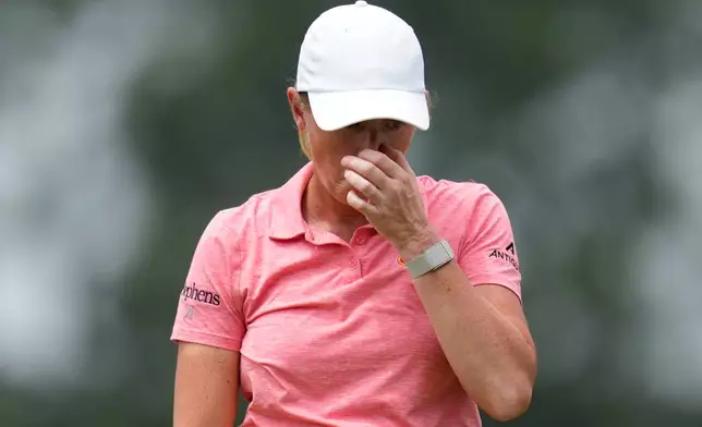 Stacy Lewis walks off the 18th green after the second round of the Chevron Championship LPGA golf tournament Friday, April 24, 2026, in Houston. (AP Photo/Ashley Landis)