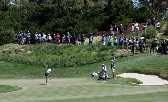 Nelly Korda putts on the fourth green during the final round of the Aramco Championship golf tournament Sunday, April 5, 2026, in North Las Vegas, Nev. (AP Photo/Ian Maule)