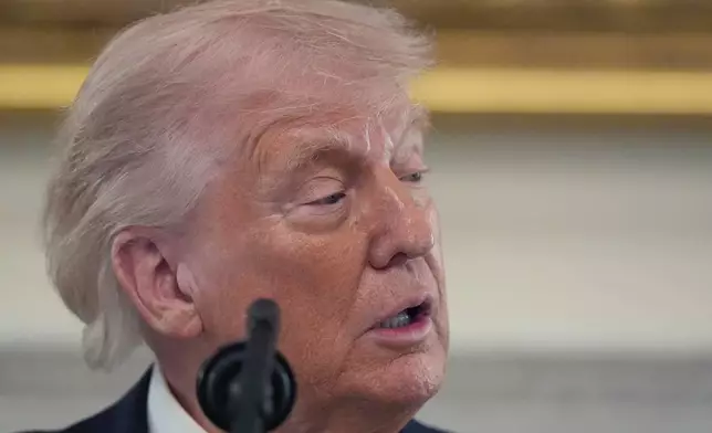 President Donald Trump speaks during an event for NCAA national champions in the State Dining Room of the White House, Tuesday, April 21, 2026, in Washington. (AP Photo/Alex Brandon)