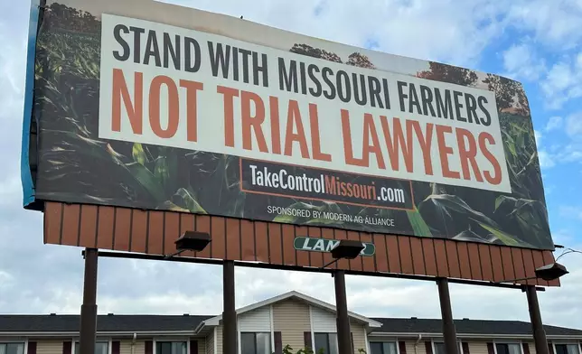 FILE - A billboard supporting legislation that would provide legal protection to manufacturers of pesticides is displayed, May 13, 2024, in Jefferson City, Mo. (AP Photo/David A. Lieb, File)