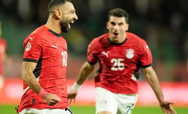 FILE - Egypt's Mohamed Salah celebrates after scoring his side's third goal during the Africa Cup of Nations round of 16 soccer match between Egypt and Benin in Agadir, Morocco, Monday, Jan. 5, 2026. (AP Photo/Mosa'ab Elshamy, File)