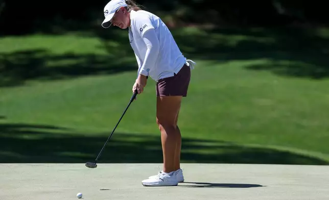 Lauren Coughlin putts on the second green during the final round of the Aramco Championship golf tournament Sunday, April 5, 2026, in North Las Vegas, Nev. (AP Photo/Ian Maule)