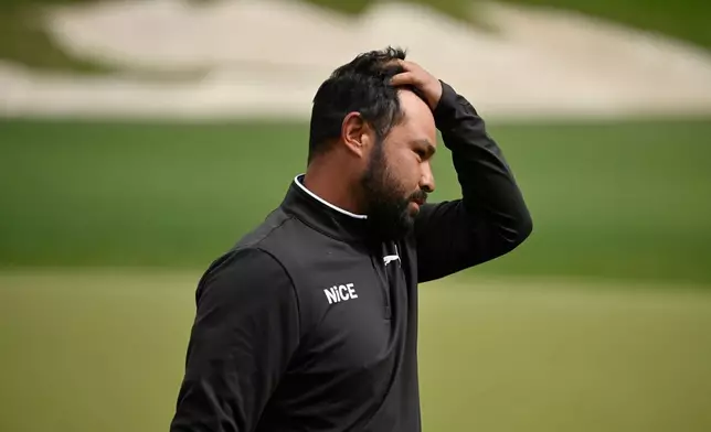 J.J. Spaun walks off of the 18th hole after the fourth round of the Valero Texas Open golf tournament in San Antonio, Sunday, April 5, 2026. (AP Photo/Darren Abate)