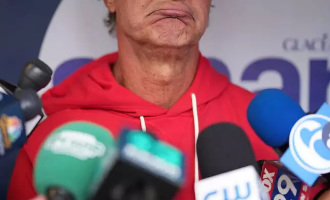Philadelphia Phillies interim manager Don Mattingly grimaces as he speaks during a news conference before a baseball game against the San Francisco Giants Tuesday, April 28, 2026, in Philadelphia. (AP Photo/Matt Slocum)