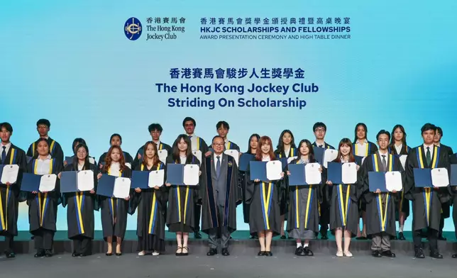 Club Chairman The Hon Martin Liao (front row, centre) with The Hong Kong Jockey Club Striding On Scholarship awardees.