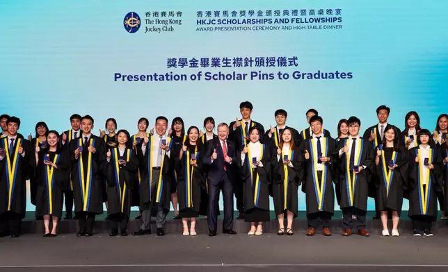 Club Chief Executive Officer Winfried Engelbrecht-Bresges (front row, centre) with graduating JC Scholars.