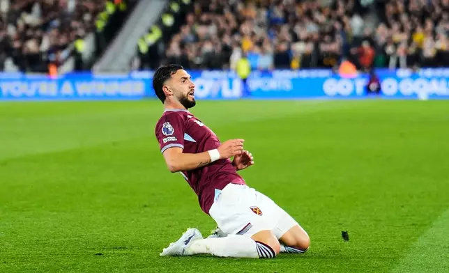 West Ham United's Taty Castellanos celebrates scoring their side's third goal of the game during their English Premier League soccer match against Wolverhampton Wanderers in London, Friday, April 10, 2026. (Jordan Pettitt/PA via AP)