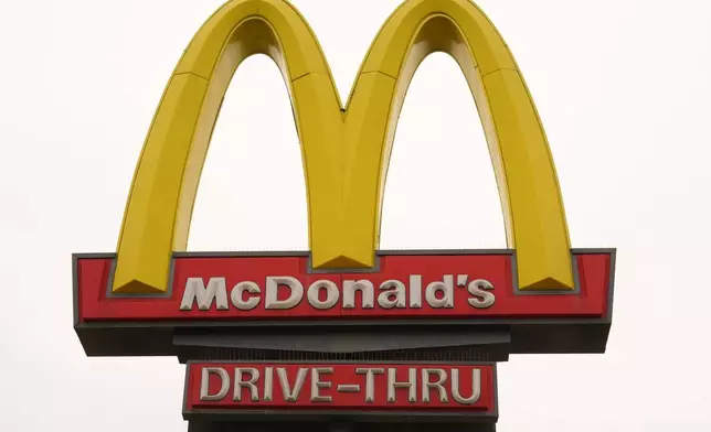 A McDonald's Golden Arch logo is displayed, Tuesday, March 31, 2026, in Los Angeles. (AP Photo/Damian Dovarganes)