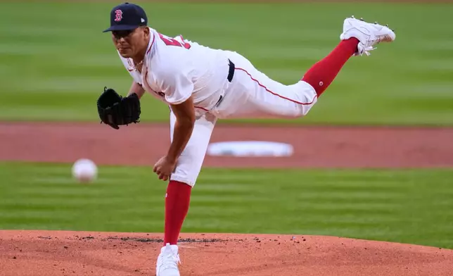 Boston Red Sox pitcher Ranger Suarez delivers during the first inning of a baseball game against the New York Yankees at Fenway Park, Wednesday, April 22, 2026, in Boston. (AP Photo/Charles Krupa)