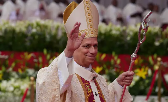 Pope Leo XIV arrives to celebrate the Holy mass at the Malabo stadium, in Malabo, Equatorial Guinea, Thursday, April 23, 2026, on the last day of his 11-day pastoral visit to Africa. (AP Photo/Misper Apawu)