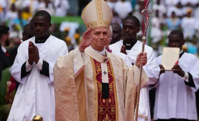 Pope Leo XIV arrives to celebrate the Holy mass at the Malabo stadium, in Malabo, Equatorial Guinea, Thursday, April 23, 2026, on the last day of his 11-day pastoral visit to Africa. (AP Photo/Misper Apawu)