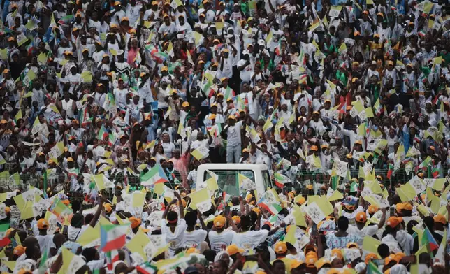 Pope Leo XIV arrives to celebrate the Holy mass at the Malabo stadium, in Malabo, Equatorial Guinea, Thursday, April 23, 2026, on the last day of his 11-day pastoral visit to Africa. (AP Photo/Andrew Medichini)
