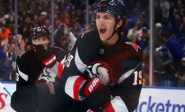 Buffalo Sabres center Peyton Krebs (19) celebrates his goal during the first period of an NHL hockey game against the Columbus Blue Jackets Thursday, April 9, 2026, in Buffalo, N.Y. (AP Photo/Jeffrey T. Barnes)