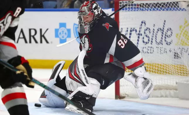Buffalo Sabres goaltender Colten Ellis (92) makes a pad-save during the second period of an NHL hockey game against the Columbus Blue Jackets, Thursday, April 9, 2026, in Buffalo, N.Y. (AP Photo/Jeffrey T. Barnes)