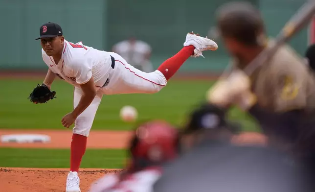 Boston Red Sox starting pitcher Ranger Suarez delivers a pitch in the first inning of a baseball game against the San Diego Padres, Sunday, April 5, 2026, in Boston. (AP Photo/Robert F. Bukaty)