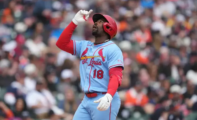 St. Louis Cardinals' Jordan Walker celebrates his grand slam against the Detroit Tigers in the fifth inning of a baseball game Saturday, April 4, 2026, in Detroit. (AP Photo/Paul Sancya)