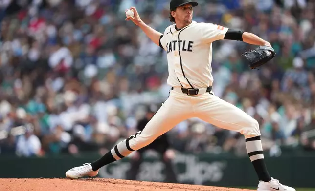 Seattle Mariners starting pitcher Logan Gilbert throws against the Houston Astros during the second inning of a baseball game, Sunday, April 12, 2026, in Seattle. (AP Photo/Lindsey Wasson)