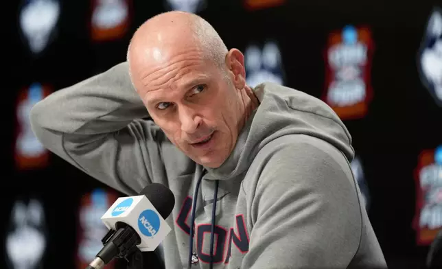 UConn head coach Dan Hurley pauses during a news conference ahead of a national semifinal NCAA college basketball tournament game against Illinois at the Final Four, Thursday, April 2, 2026, in Indianapolis. (AP Photo/Abbie Parr)