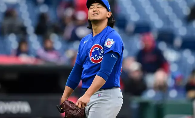 Chicago Cubs starting pitcher Shota Imanaga reacts before being removed from the game by manager Craig Counsell in the sixth inning in the second baseball game of a doubleheader against the Cleveland Guardians, Sunday, April 5, 2026, in Cleveland. (AP Photo/David Dermer)