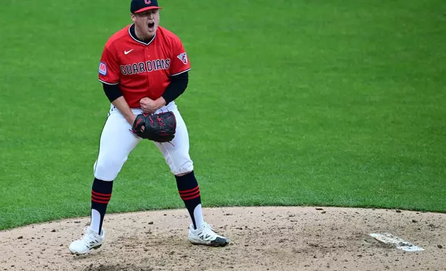 Cleveland Guardians starting pitcher Parker Messick reacts after striking out Chicago Cubs' Alex Bregman in the fifth inning in the second baseball game of a doubleheader, Sunday, April 5, 2026, in Cleveland. (AP Photo/David Dermer)