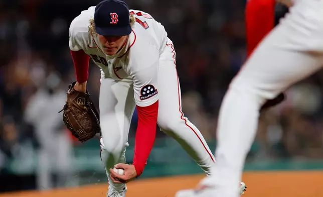 Boston Red Sox pitcher Connelly Early barehands the ball during the fifth inning of a baseball game against the New York Yankees on Tuesday, April 21, 2026, in Boston. (AP Photo/CJ Gunther)