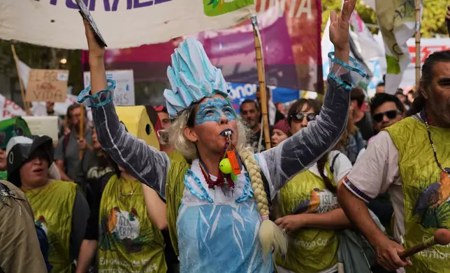 Demonstrators protest outside Congress as lawmakers debate the Javier Milei government's proposal to reform the glacier protection law in Buenos Aires, Argentina, Wednesday, April 8, 2026. (AP Photo/Rodrigo Abd)