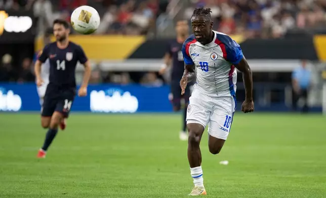 FILE - Haiti's Louicius Don Deedson (10) keeps an eye on the ball during a CONCACAF Gold Cup soccer match against the United States Sunday, June 22, 2025, in Arlington, Texas. (AP Photo/Jessica Tobias, File)