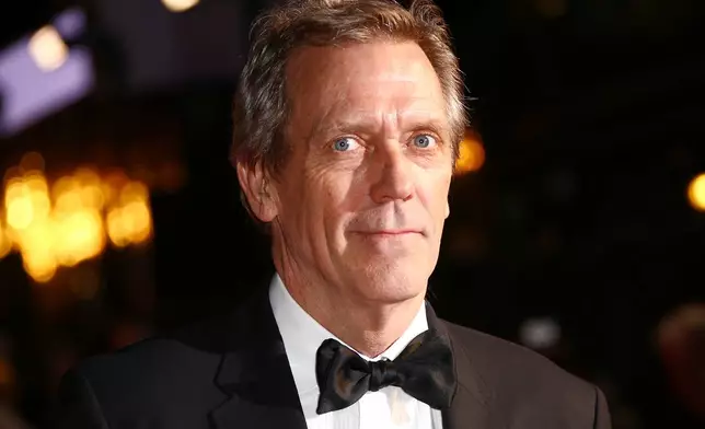 FILE - Hugh Laurie appears at the opening gala of the London Film Festival in London on Oct. 2, 2019. (Photo by Joel C Ryan/Invision/AP, File)