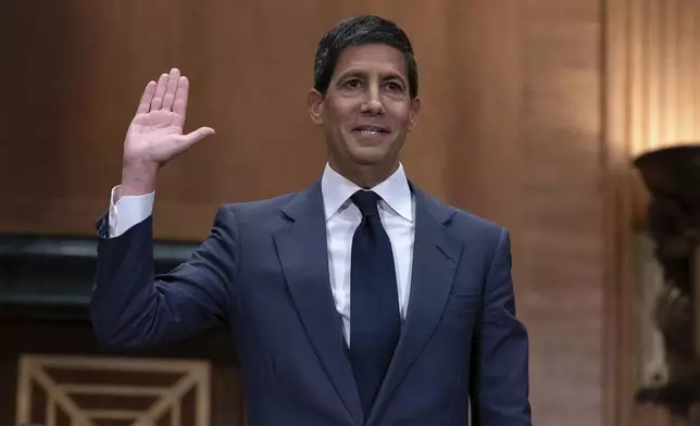Kevin Warsh is sworn in during his nomination hearing to be a member and chairman of the Federal Reserve Board of Governors before the Senate Banking, Housing and Urban Affairs Committee on Capitol Hill, in Washington Tuesday, April 21, 2026. (AP Photo/Jose Luis Magana)