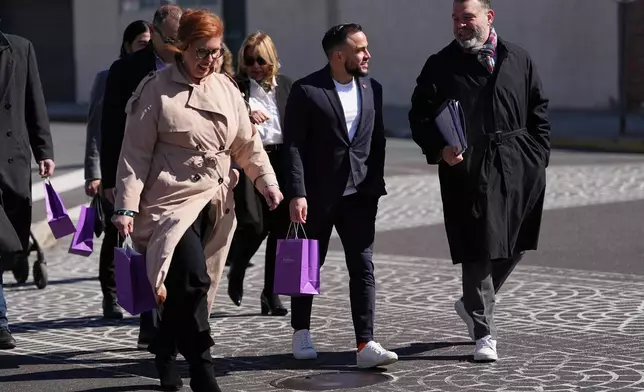 Lancaster Pa., Mayor Jaime Arroyo speaks with attendees at the ribbon cutting for a Finanta Credit Union in Reading, Pa., Wednesday, April 8, 2026. (AP Photo/Matt Rourke)