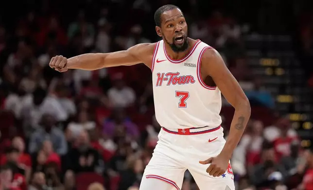 Houston Rockets forward Kevin Durant (7) reacts during the first half of an NBA basketball game against the Minnesota Timberwolves, Friday, April 10, 2026, in Houston. (AP Photo/ Karen Warren)