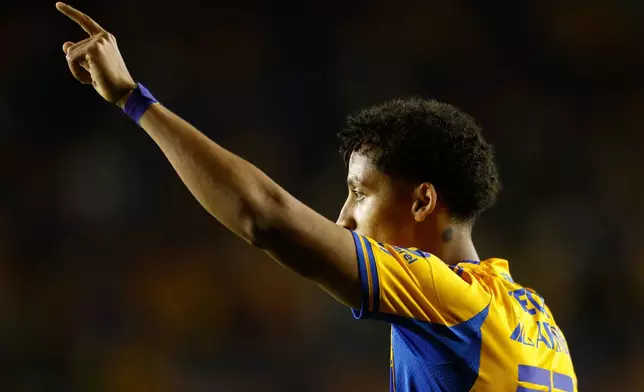 Ozziel Herrera of Mexico's Tigres celebrates scoring his side's opening goal against the United States' Seattle Sounders during a CONCACAF Champions Cup quarterfinal first leg soccer match in Monterrey, Mexico, Wednesday, April 8, 2026. (AP Photo/Jorge Mendoza)