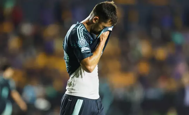 Jackson Ragen of the United States' Seattle Sounders after scoring an own goal during a CONCACAF Champions Cup quarterfinal first leg soccer match against Mexico's Tigres in Monterrey, Mexico, Wednesday, April 8, 2026. (AP Photo/Jorge Mendoza)