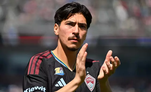 Colorado Rapids midfielder Josh Atencio claps prior to an MLS soccer game against the Inter Miami CF Saturday, April 18, 2026, in Denver. (AP Photo/Geneva Heffernan)