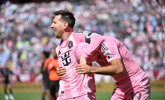 Inter Miami CF forwards Lionel Messi and Germán Berterame celebrate after a goal by Berterame in the first half of an MLS soccer game against the Colorado Rapids Saturday, April 18, 2026, in Denver. (AP Photo/Geneva Heffernan)