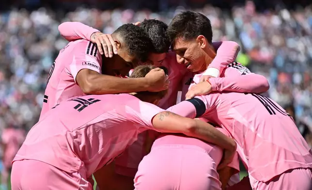 Members of Inter Miami CF celebrate after a goal by forward Germán Berterame in the first half of an MLS soccer game against the Colorado Rapids Saturday, April 18, 2026, in Denver. (AP Photo/Geneva Heffernan)