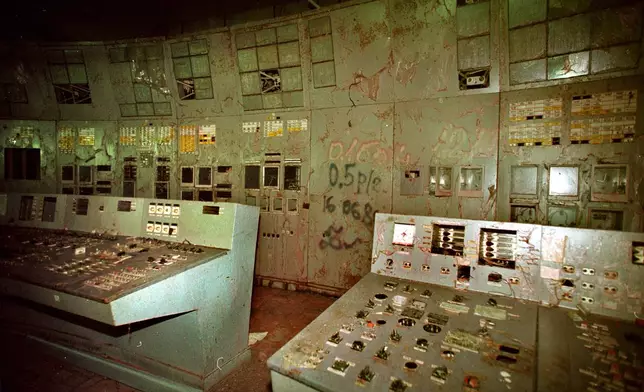 FILE - The highly contaminated control room for Reactor No. 4 is seen inside the Chernobyl nuclear power plant in Chernobyl, Ukraine, Nov. 10, 2000. Engineers threw a switch at 1:23 a.m. on April 26, 1986, that triggered two explosions and the world's worst nuclear disaster. (AP Photo/Efrem Lukatsky, File)