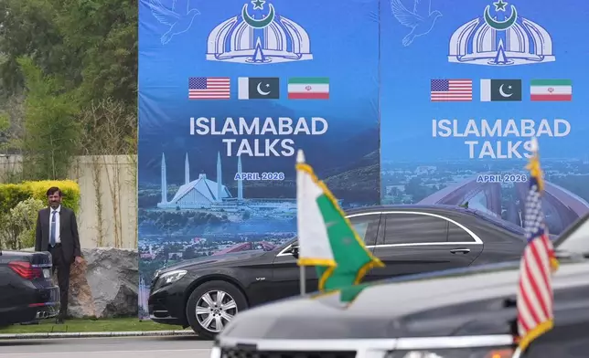A Pakistani official is seen during the arrival of the U.S. Vice President JD Vance for talks with Iranian officials in Islamabad, Pakistan, Saturday, April 11, 2026. (AP Photo/Jacquelyn Martin, Pool)