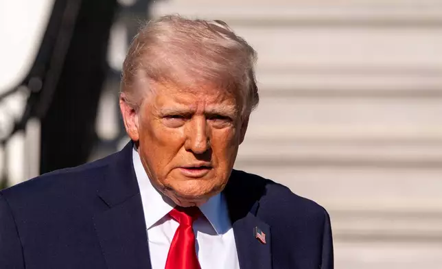 President Donald Trump speaks with reporters before departing on Marine One from the South Lawn of the White House, Saturday, April 11, 2026, in Washington. (AP Photo/Alex Brandon)