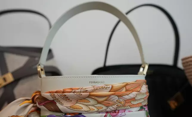 Bags are displayed during an interview with James Ferragamo, Men's and Women's Leather Product Director for the Salvatore Ferragamo group, with Associated Press in Milan, Italy, Wednesday, April 22, 2026. (AP Photo/Antonio Calanni)