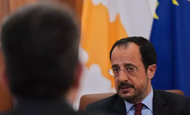 Cypriot President Nikos Christodoulides speaks during an Associated Press interview ahead of this week's major EU-Middle East summit, at the presidential palace in the capital Nicosia, Cyprus, Tuesday, April 21, 2026. (AP Photo/Petros Karadjias)